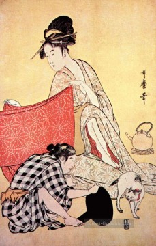 Frauen, die Kleider machen 2 Kitagawa Utamaro Japanisch Ölgemälde